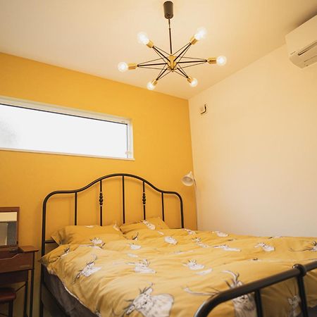 Orange County Guest House Идзумисано Номер фото